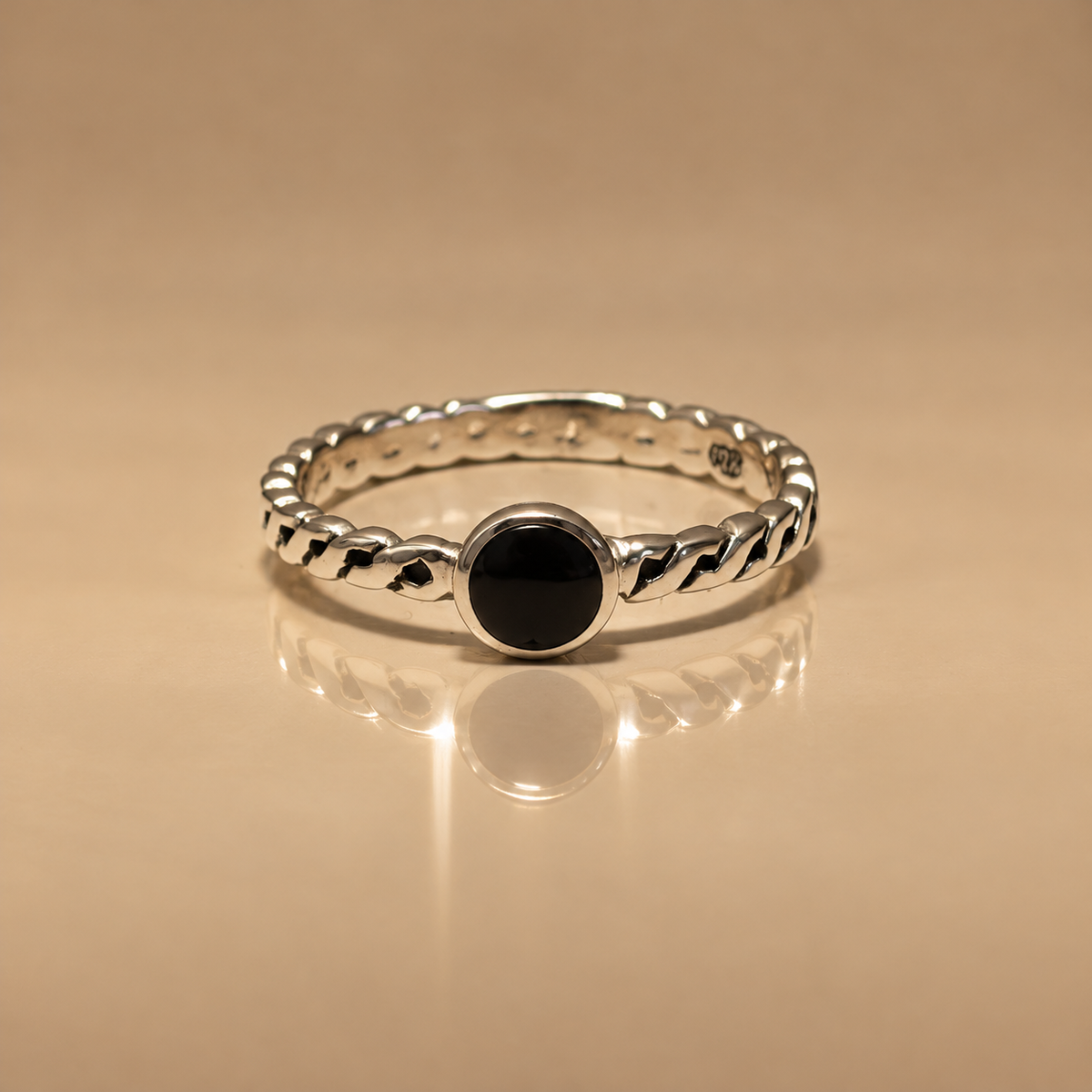Ribbon Onyx Ring, sterling silver braided band with a round black onyx stone