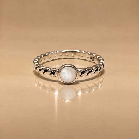 Ribbon Pearl Ring, sterling silver braided band with a round mother of pearl stone