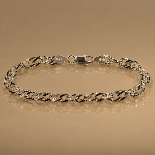 Twisty Bracelet, sterling silver twisted-link chain bracelet with lobster clasp, on a beige background