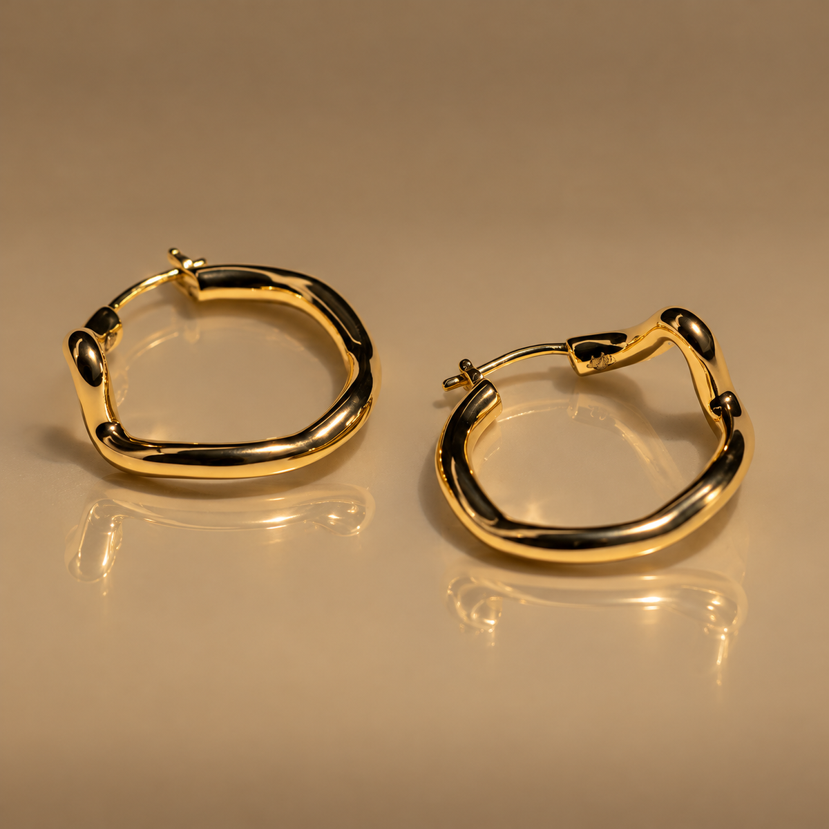 Milk & Rose Heartbeat Hoops - pair of wavy gold hoop earrings